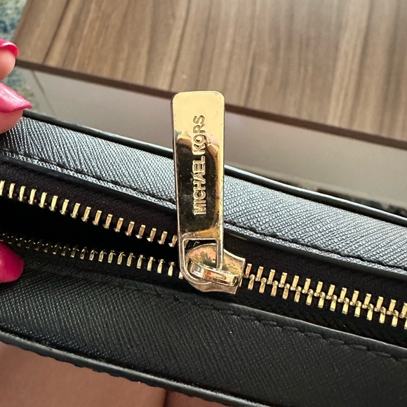 Michael kors black cross body purse with gold accents - Picture 7 of 8